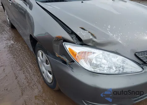 2003 Toyota Camry Le z USA, uszkodzony, nr VIN 4T1BE32K83U768702